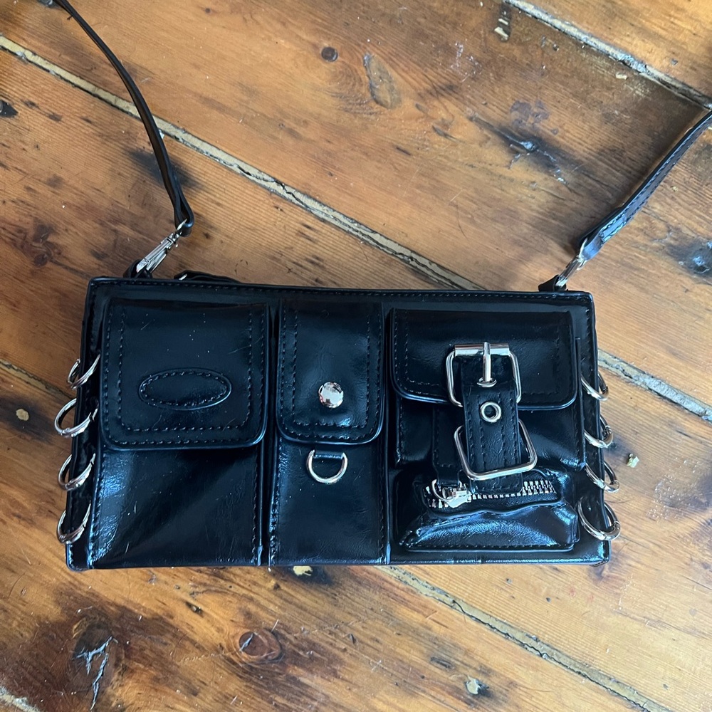 Urban Outfitters Glossy Black Crossbody Bag with Silver Accents
